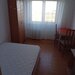 Camera in apartament de 4 camere